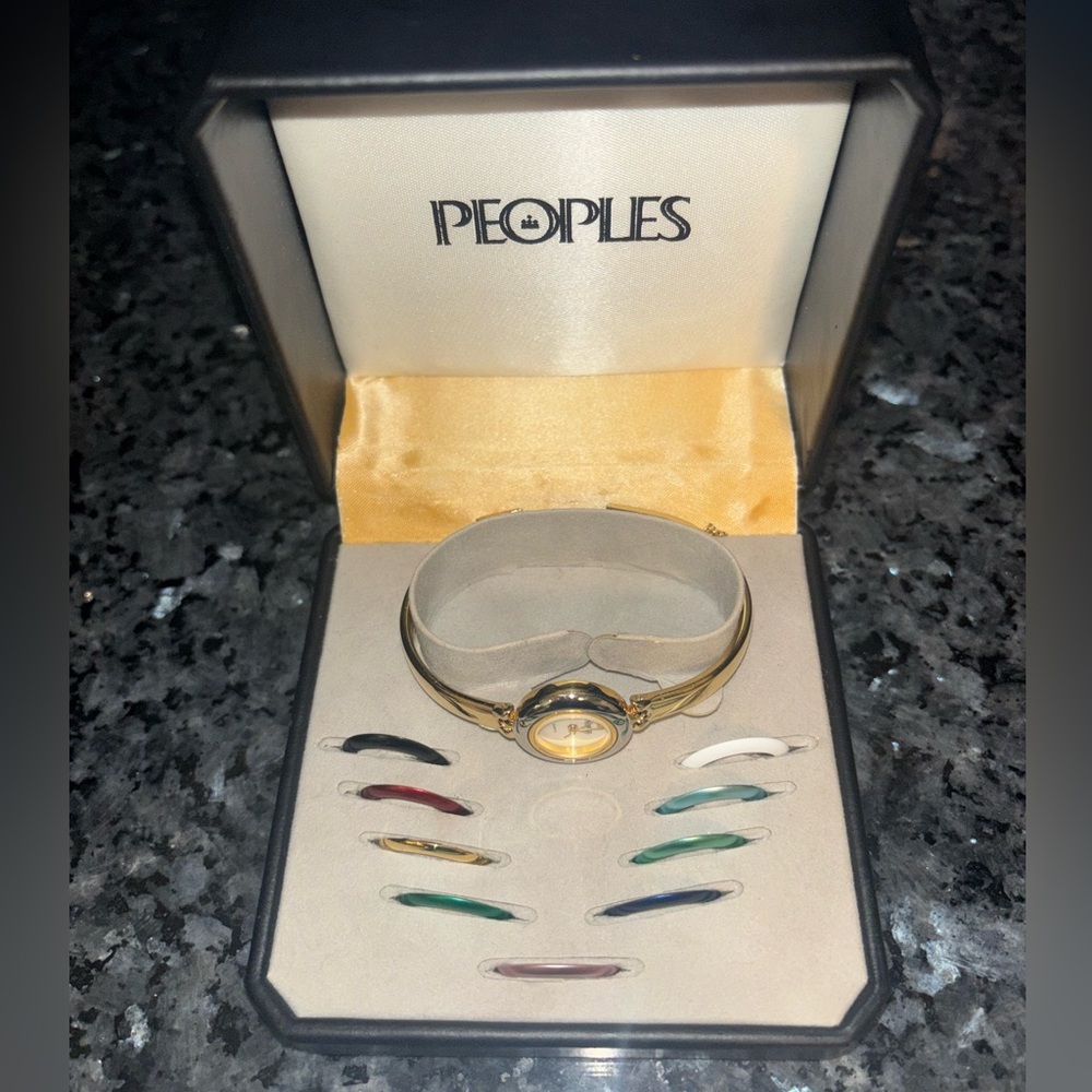 Gold watch stainless steel with colourful change heads
